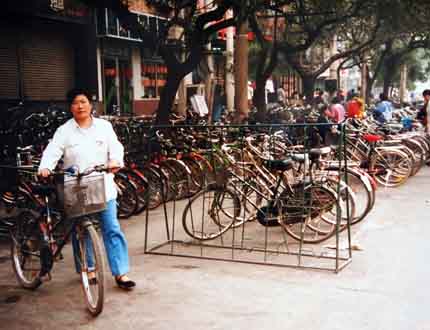 disabled traveler in china rides bicycle