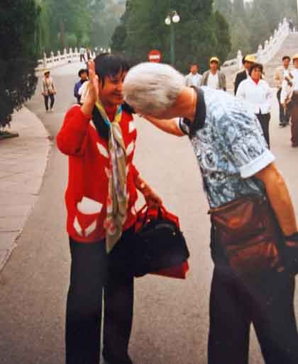 disabled travelers in wheelchairs meet people in China