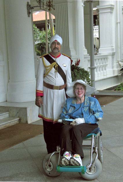 disabled travel wheelchair singapore doorman