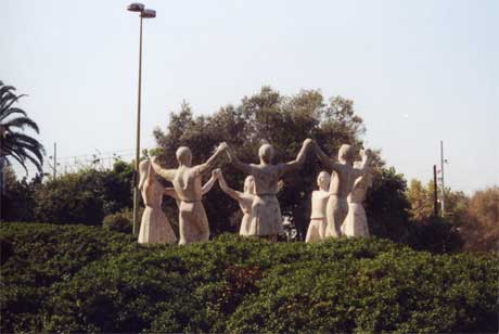 Statues of People holding hands in a circle in beautiful Spain